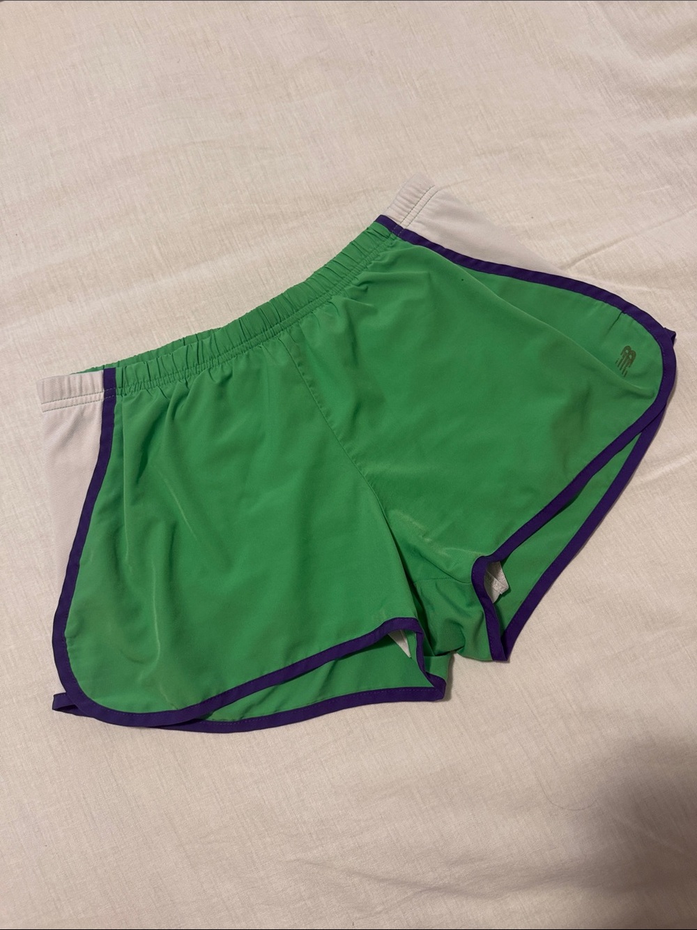 New Balance Green Athletic Shorts with Purple Trim